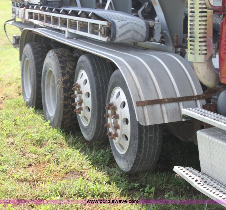 image for item I7395 2001 Volvo WG Super Stone Slinger semi truck