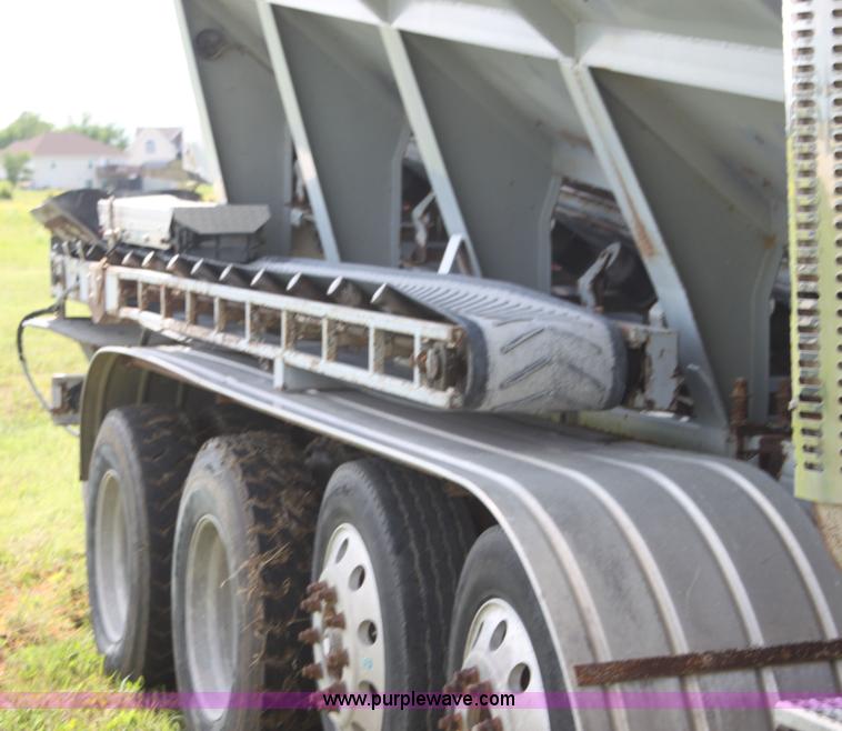 image for item I7395 2001 Volvo WG Super Stone Slinger semi truck