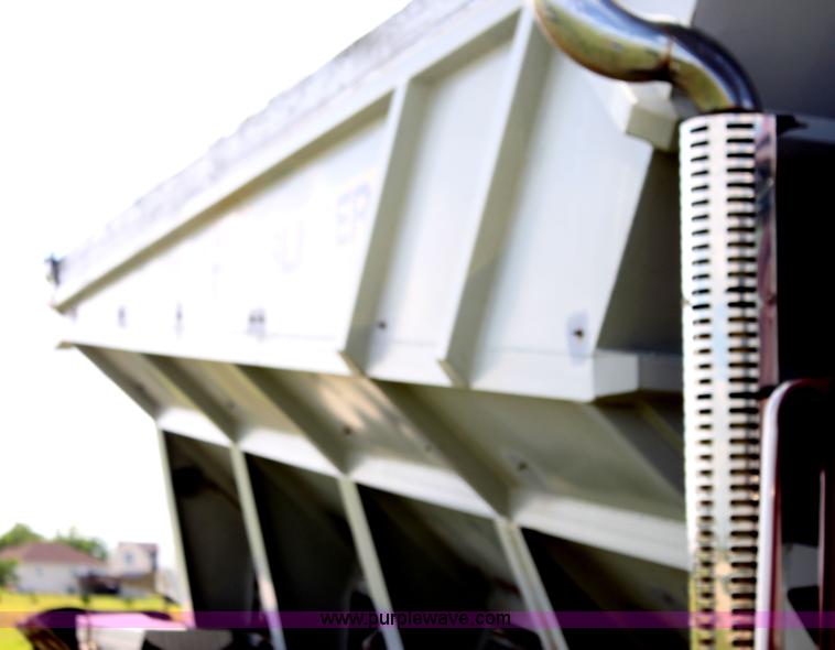 image for item I7395 2001 Volvo WG Super Stone Slinger semi truck