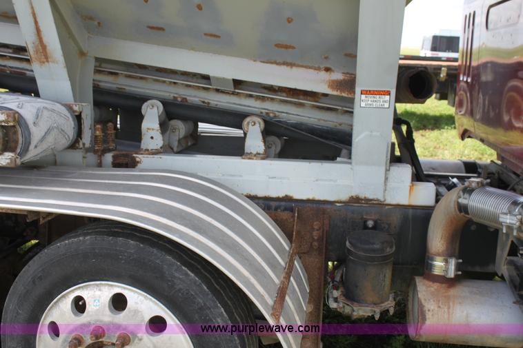 image for item I7395 2001 Volvo WG Super Stone Slinger semi truck