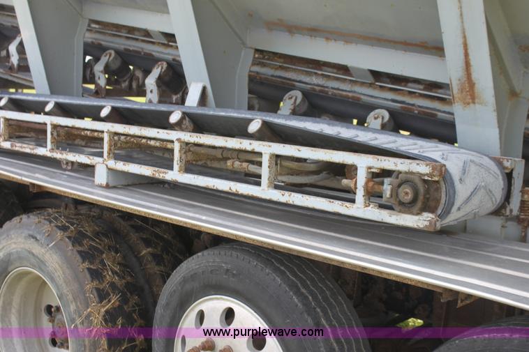 image for item I7395 2001 Volvo WG Super Stone Slinger semi truck