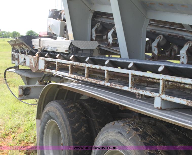 image for item I7395 2001 Volvo WG Super Stone Slinger semi truck