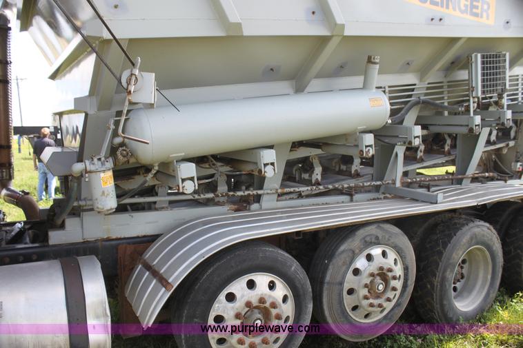 image for item I7395 2001 Volvo WG Super Stone Slinger semi truck