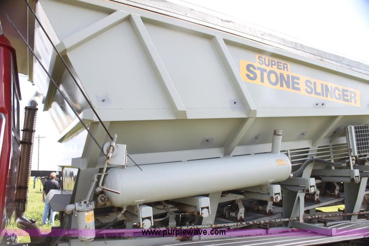 image for item I7395 2001 Volvo WG Super Stone Slinger semi truck