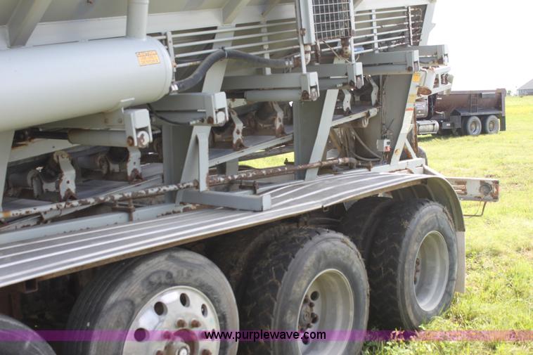 image for item I7395 2001 Volvo WG Super Stone Slinger semi truck