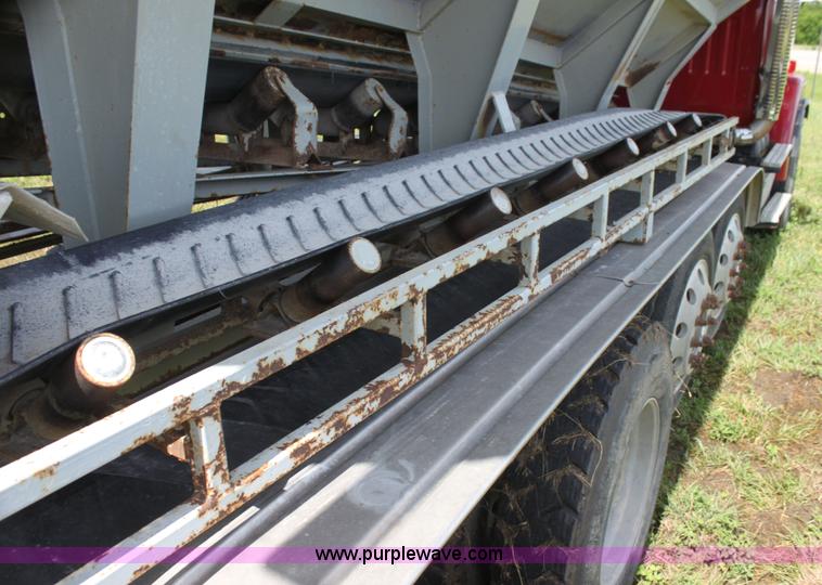 image for item I7395 2001 Volvo WG Super Stone Slinger semi truck