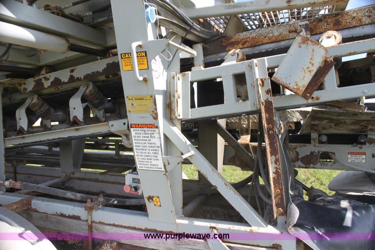 image for item I7395 2001 Volvo WG Super Stone Slinger semi truck