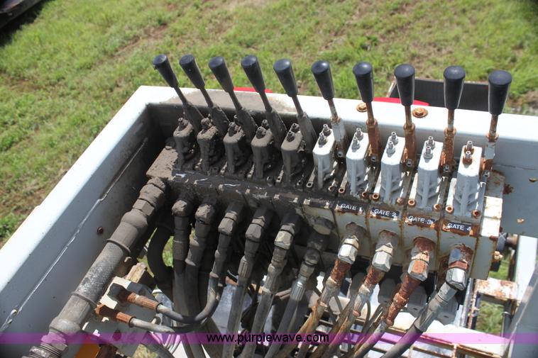 image for item I7395 2001 Volvo WG Super Stone Slinger semi truck