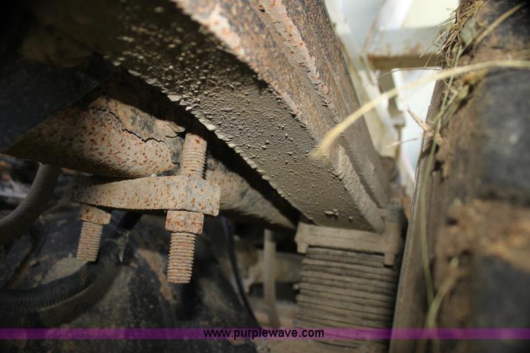 image for item I7395 2001 Volvo WG Super Stone Slinger semi truck