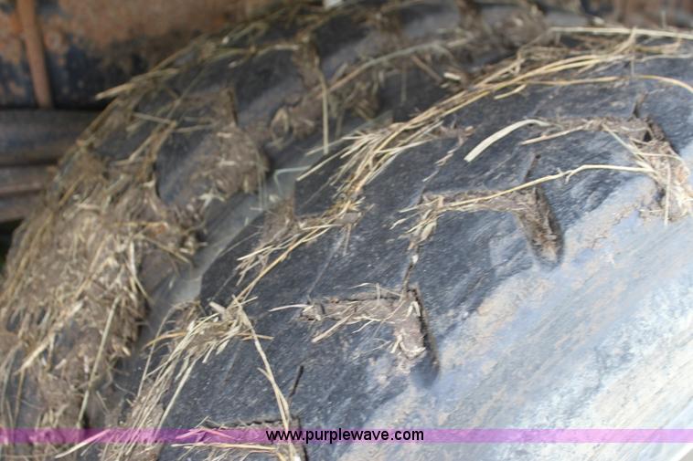 image for item I7395 2001 Volvo WG Super Stone Slinger semi truck