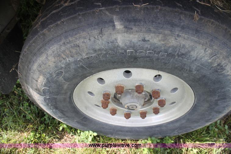 image for item I7395 2001 Volvo WG Super Stone Slinger semi truck