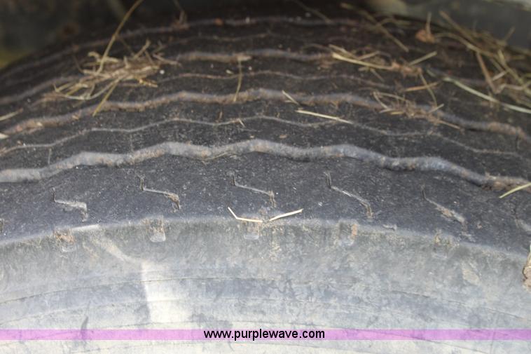 image for item I7395 2001 Volvo WG Super Stone Slinger semi truck