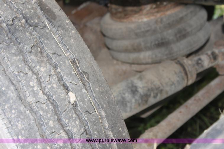 image for item I7395 2001 Volvo WG Super Stone Slinger semi truck