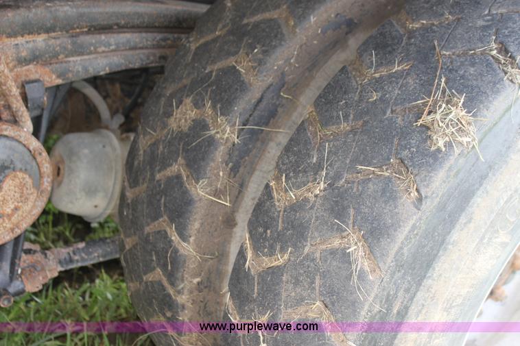 image for item I7395 2001 Volvo WG Super Stone Slinger semi truck