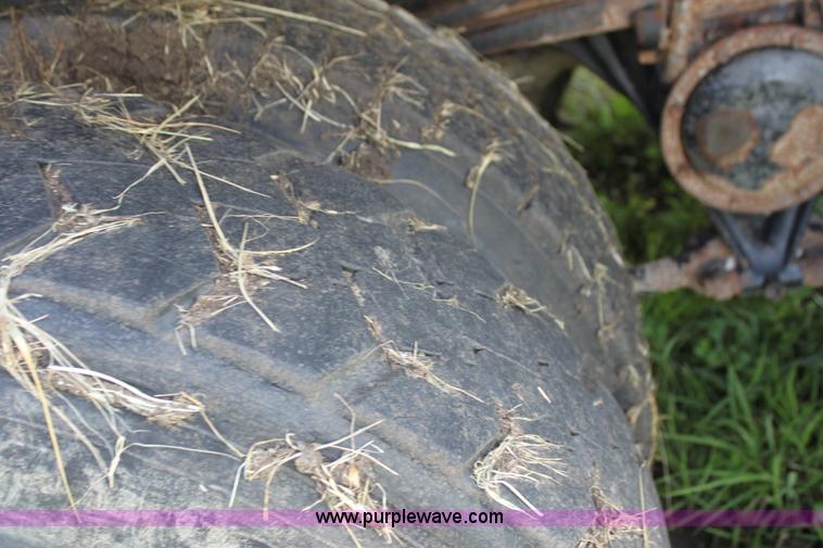 image for item I7395 2001 Volvo WG Super Stone Slinger semi truck