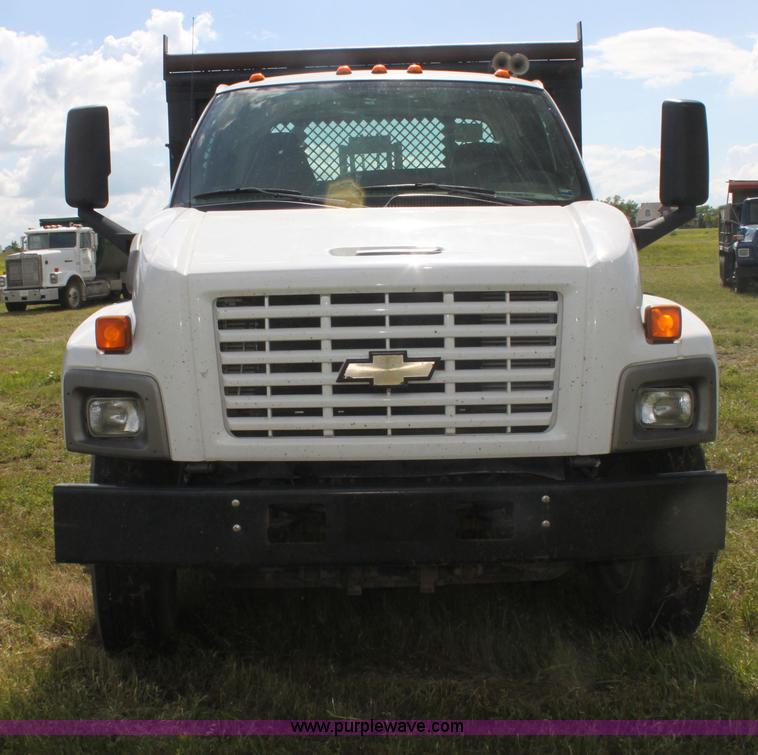 image for item I7396 2006 Chevrolet C8500 flatbed truck with forklift