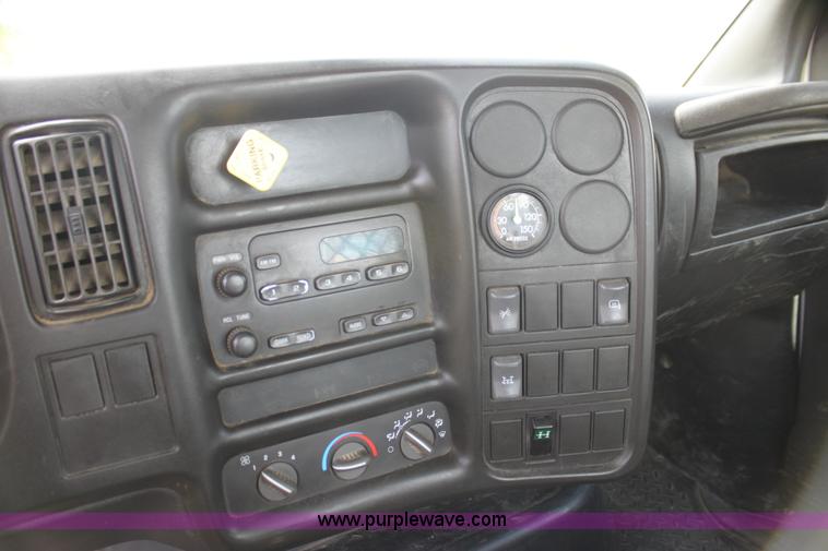 image for item I7396 2006 Chevrolet C8500 flatbed truck with forklift