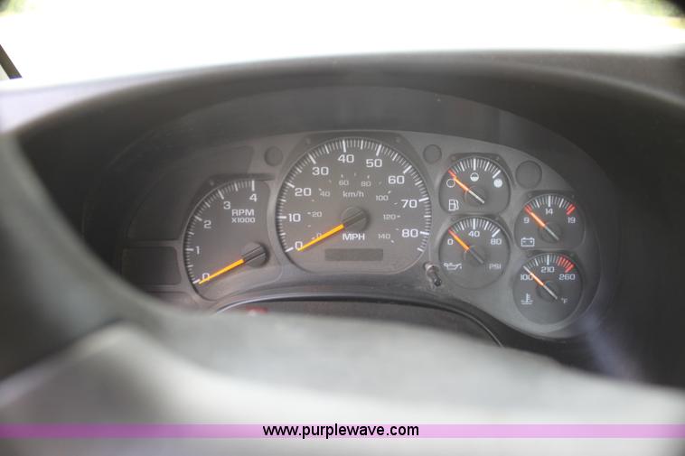 image for item I7396 2006 Chevrolet C8500 flatbed truck with forklift