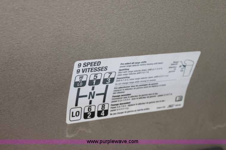 image for item I7396 2006 Chevrolet C8500 flatbed truck with forklift