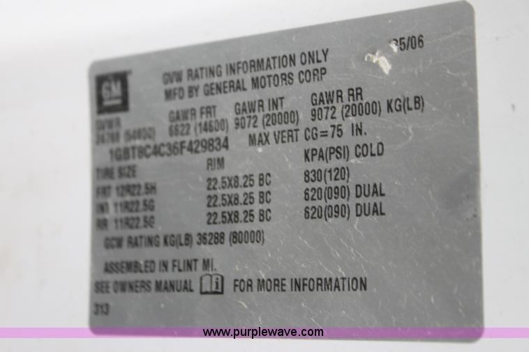 image for item I7396 2006 Chevrolet C8500 flatbed truck with forklift