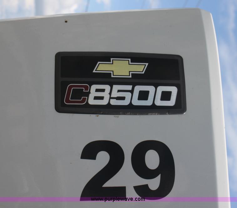 image for item I7396 2006 Chevrolet C8500 flatbed truck with forklift