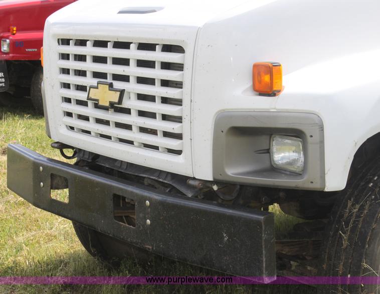 image for item I7396 2006 Chevrolet C8500 flatbed truck with forklift