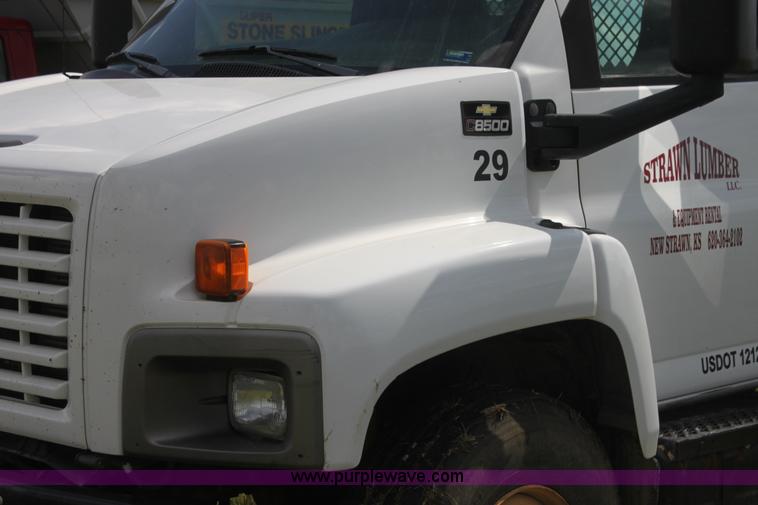 image for item I7396 2006 Chevrolet C8500 flatbed truck with forklift