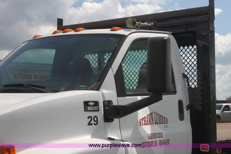 image for item I7396 2006 Chevrolet C8500 flatbed truck with forklift