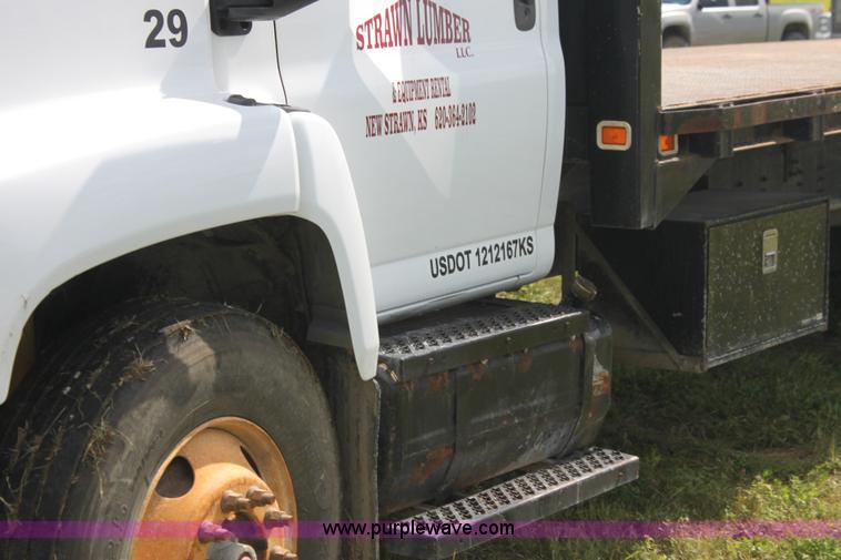 image for item I7396 2006 Chevrolet C8500 flatbed truck with forklift