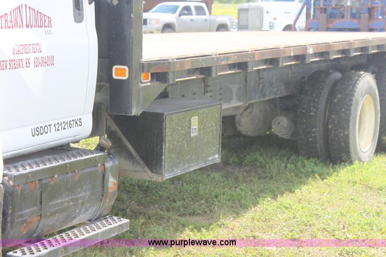 image for item I7396 2006 Chevrolet C8500 flatbed truck with forklift