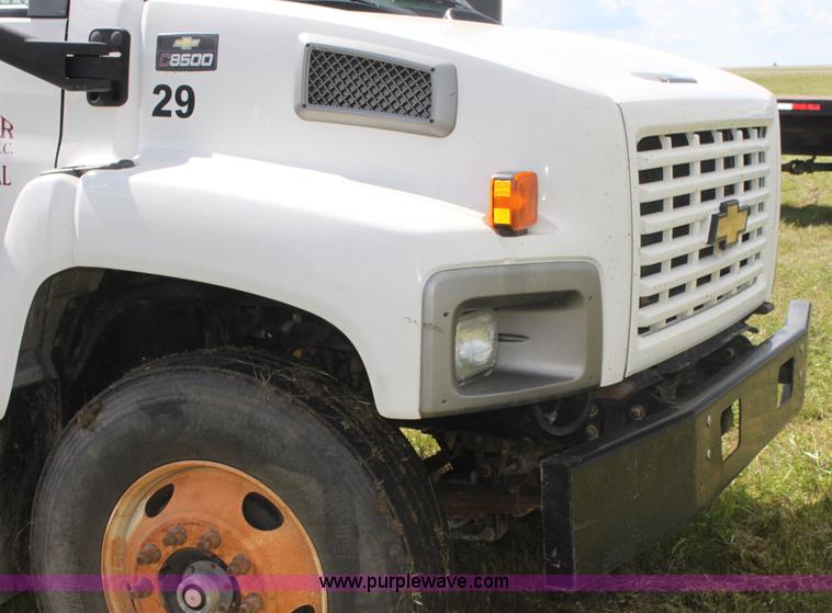 image for item I7396 2006 Chevrolet C8500 flatbed truck with forklift