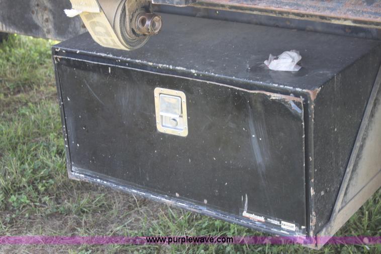 image for item I7396 2006 Chevrolet C8500 flatbed truck with forklift