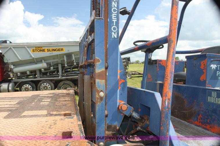 image for item I7396 2006 Chevrolet C8500 flatbed truck with forklift