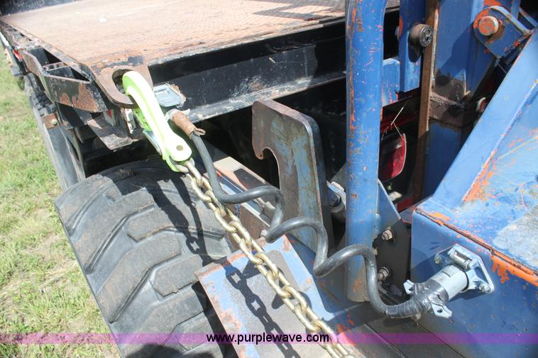 image for item I7396 2006 Chevrolet C8500 flatbed truck with forklift