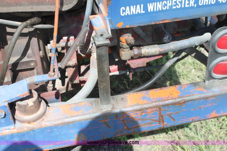 image for item I7396 2006 Chevrolet C8500 flatbed truck with forklift