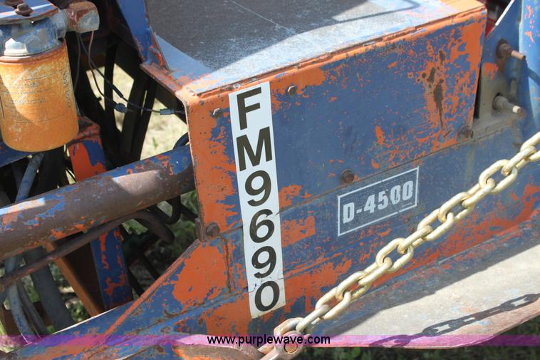 image for item I7396 2006 Chevrolet C8500 flatbed truck with forklift