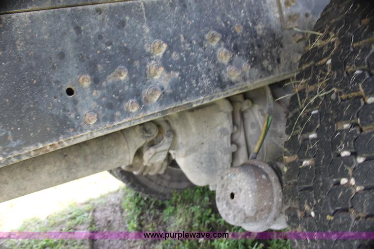 image for item I7396 2006 Chevrolet C8500 flatbed truck with forklift