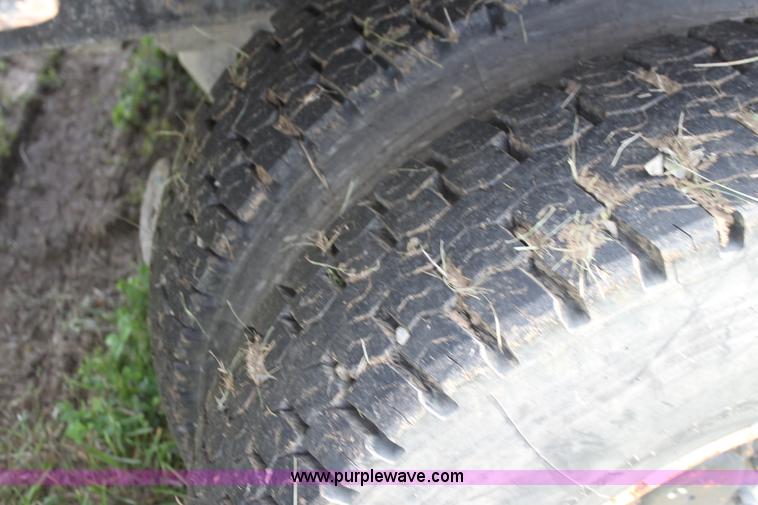 image for item I7396 2006 Chevrolet C8500 flatbed truck with forklift