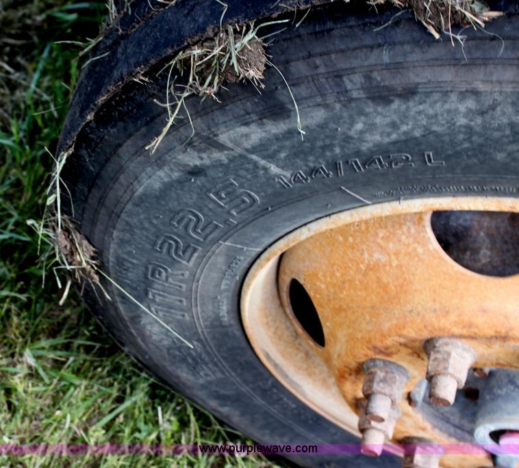 image for item I7396 2006 Chevrolet C8500 flatbed truck with forklift