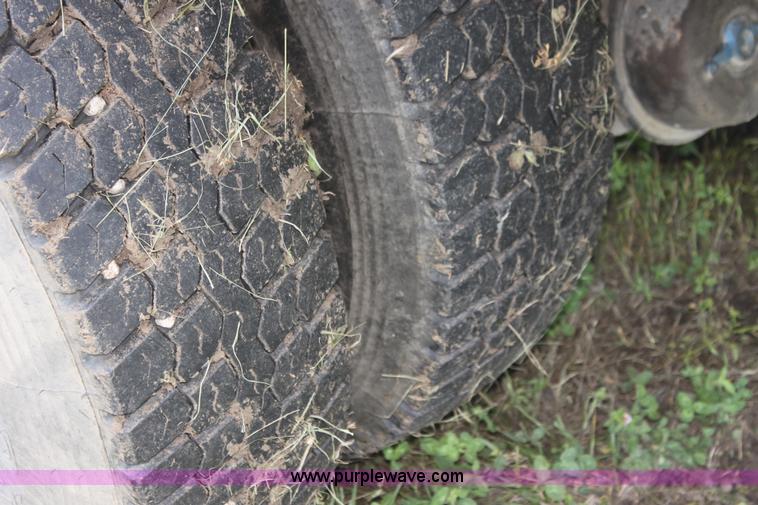 image for item I7396 2006 Chevrolet C8500 flatbed truck with forklift