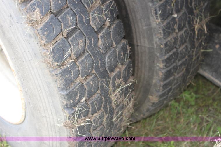 image for item I7396 2006 Chevrolet C8500 flatbed truck with forklift