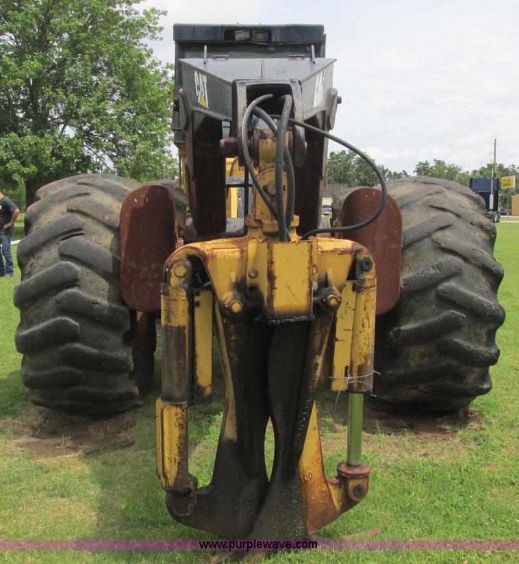 image for item J2500 2002 Caterpillar 525B grapple skidder