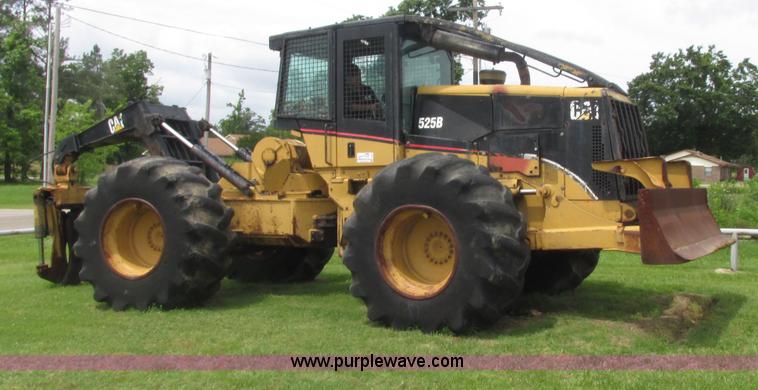 image for item J2500 2002 Caterpillar 525B grapple skidder