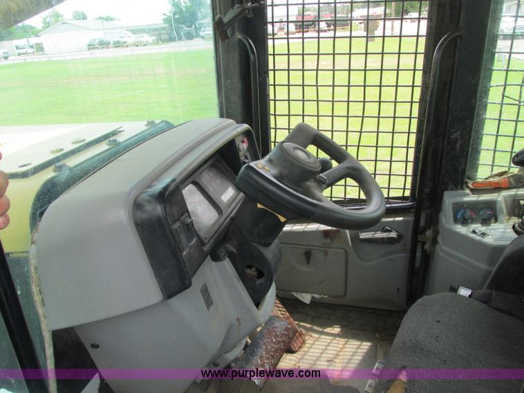 image for item J2500 2002 Caterpillar 525B grapple skidder