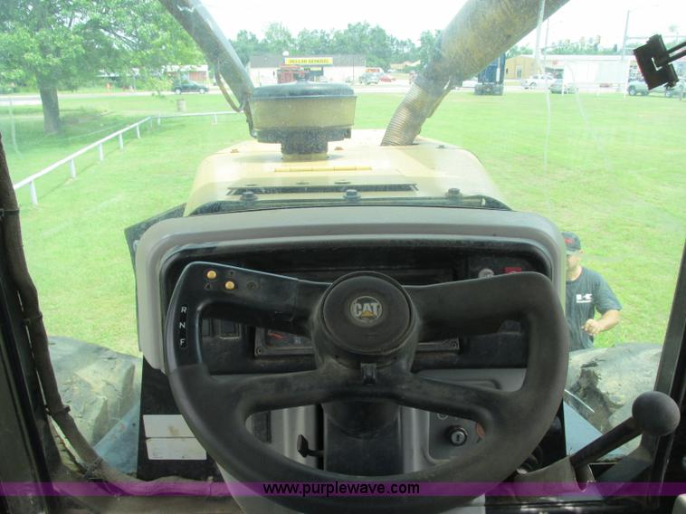 image for item J2500 2002 Caterpillar 525B grapple skidder