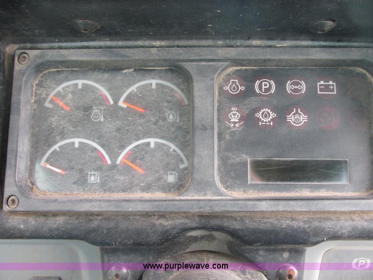 image for item J2500 2002 Caterpillar 525B grapple skidder