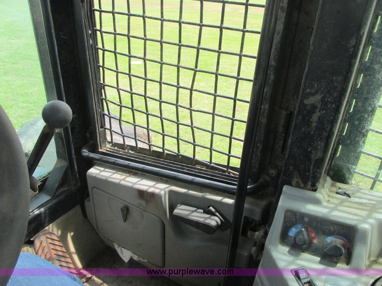 image for item J2500 2002 Caterpillar 525B grapple skidder