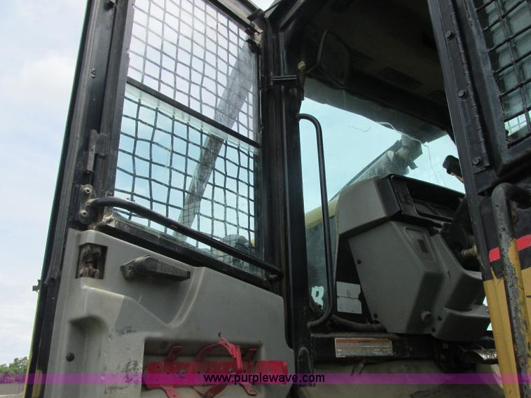 image for item J2500 2002 Caterpillar 525B grapple skidder