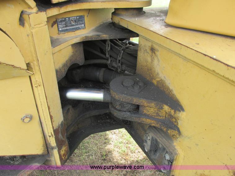 image for item J2500 2002 Caterpillar 525B grapple skidder