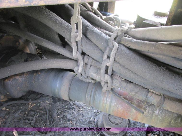 image for item J2500 2002 Caterpillar 525B grapple skidder